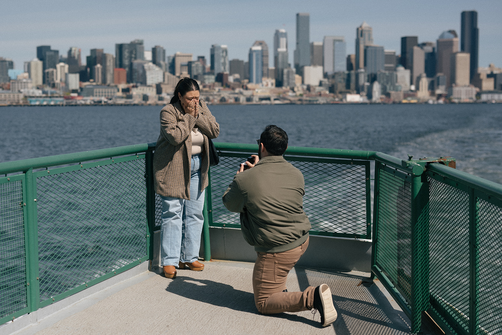Alyssa covers her mouth in disbelief as Johnny proposes