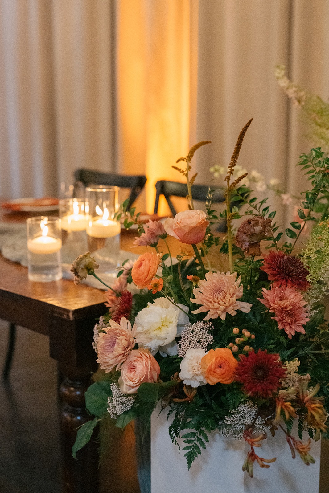 Bridal bouquet with warm-toned florals by Farmhouse Box and Bloom